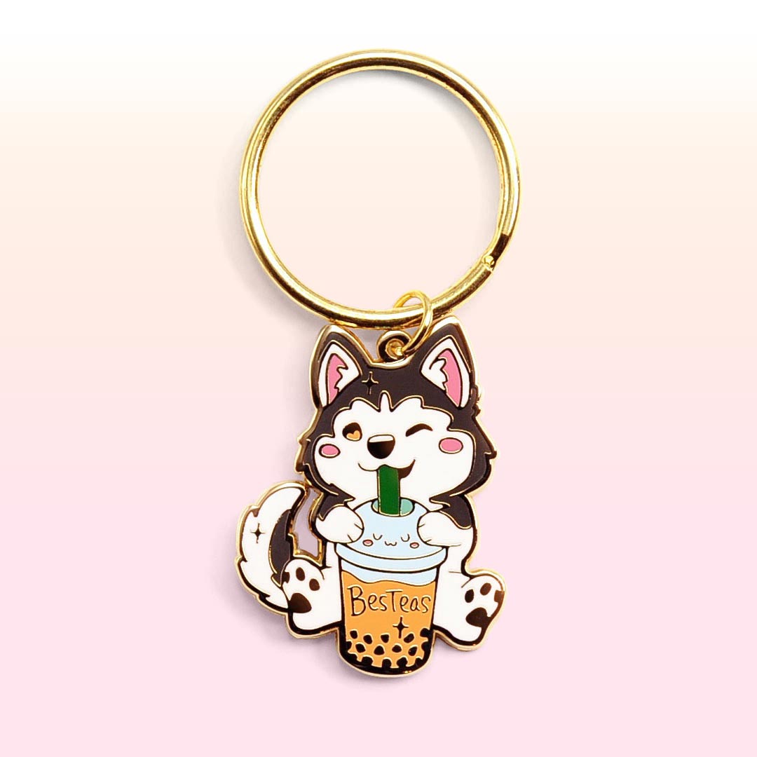 https://flairfighter.com/cdn/shop/products/bestea-bubble-tea-husky-black-cute-gold-metal-enamel-keychain-01-pink_53615ccf-d0c7-43da-9e44-006764474cf3_1200x.jpg?v=1624775859